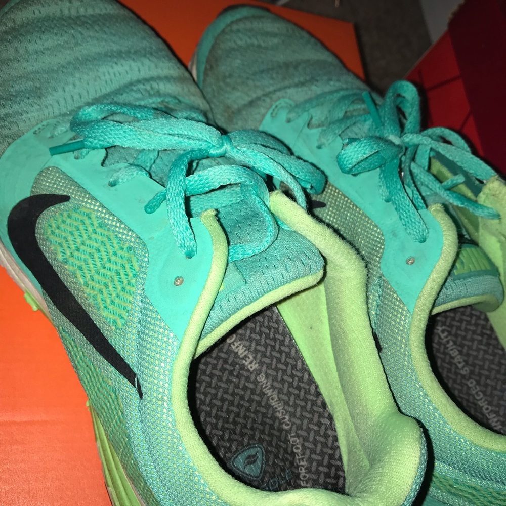 Green Nike shoes